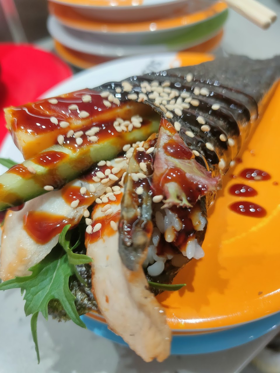 Sauced sushi on a plate at Sushi Hub Toowong